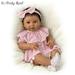The Ashton-Drake Galleries Camila Lifelike Baby Doll In Custom Outfit RealTouch Vinyl Skin Weighted Cloth Body Hand-rooted Hair Poseable by Sherry Rawn 17-inches
