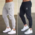 Sik sik pantaloni da Jogging uomo pantaloni da Fitness pantaloni da corsa uomo allenamento Leggings