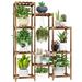 Arlmont & Co. Renica Plant Stand Wood/Manufactured Wood in Brown | 48 H x 34 W x 11.6 D in | Wayfair A8AA0CAFC09640CABD5201CEFCC27A94