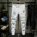 Lettere ricamate alla moda moda uomo College Boys pantaloni Skinny in Denim con cerniera pista Jeans