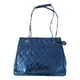 Chanel Petite Shopping Tote patent leather handbag