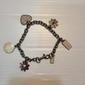 Coach Jewelry | Coach Silver-Tone Dog Leash Clip Charm Bracelet With Charms | Color: Silver | Size: Os