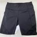 Athleta Shorts | 8 Inch Athleta Bike Shorts With Side Zip Pockets Size Medium | Color: Black | Size: M