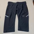 Nike Pants & Jumpsuits | - Nike Dry Fit Running Cropped Capri Pants Reflective/Back Zipper Pocket Xsmall | Color: Black | Size: Xs