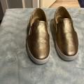 Michael Kors Shoes | Mk Used Gold Slip On Shoe Size 9 | Color: Gold | Size: 9