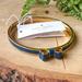 Kate Spade Jewelry | Kate Spade Bracelet Moon River Bangle Bow Gold & Navy Blue New | Color: Blue/Gold | Size: Os