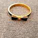 Kate Spade Jewelry | Black And Gold Kate Spade Bangle Bracelet With Clasp Opening | Color: Black/Gold | Size: Os