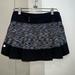 Lululemon Athletica Skirts | Lululemon Tennis/ Golf Skirt. Size 2 Black Gray Color Block | Color: Black/Gray | Size: 2