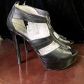 Michael Kors Shoes | Michael Kors Berkley Black Leather Zip-Up High Heels | Color: Black/Silver | Size: 8.5