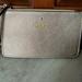 Kate Spade Bags | Kate Spade Nwot Taupe Shimmer Flat Zip Top Wallet Wristlet 8w X 5 H | Color: Gold/Tan | Size: 8”W X 5”H X Flat