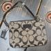 Coach Bags | Coach Small Signature Print Wristlet With Patent Leather Trim & Accents | Color: Black/Tan | Size: Os