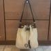 Dooney & Bourke Bags | Dooney And Bourke Vintage Genuine Leather Bucket Tote | Color: Brown/Cream | Size: Os