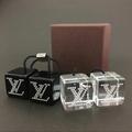 Louis Vuitton Accessories | Auth Louis Vuitton 2 Piece Set Lv Logo Rhinestone Hair Cube Accessories | Color: Black/Silver | Size: Os