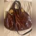 Gucci Bags | Gucci Hysteria Bag Patent Leather In Purple/Brown | Color: Brown/Purple | Size: Os