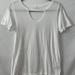 Anthropologie Tops | Anthropologie T.La Garrison Womens White Cut Out Detail Short Sleeve Tees Size S | Color: White | Size: S