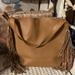 Jessica Simpson Bags | Jessica Simpson, Faux Leather Women Ten Tote, Color: Tan With Fringe On Sides.!! | Color: Gold/Tan | Size: Os