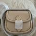 Coach Bags | Brand New Coach Beat Saddle Leather Brass/Ivory Bag In Original Packaging | Color: Cream | Size: Os