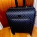 Gucci Bags | Brand New Never Used Black Gucci Carryon Luggage With Wheels. | Color: Black | Size: Os