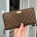 Gucci Bags | Authentic Gucci Large Zippy Wallet And Organizer In Signature Gg | Color: Brown/Cream | Size: Os