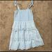 American Eagle Outfitters Dresses | American Eagle Light Blue Tiered Ruffle Eyelet Dress Adjustable Tie Straps | Color: Blue/Red/Tan | Size: L