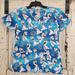 Disney Tops | Disney Frozen Olaf Women's Medical Scrub Shirt Top V-Neck Pockets Blue Size Xs | Color: Blue/White | Size: Xs