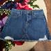 American Eagle Outfitters Skirts | American Eagle Distressed Button Fly Denim Mini Skirt Size 4 | Color: Blue/White | Size: 4