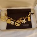 Coach Jewelry | Coch Gold Tone Charm Rhinestone Bracelet | Color: Gold | Size: Os