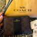 Coach Bags | Coach Monogram Wristlet | Color: Black/Brown | Size: Os