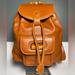 Gucci Bags | Gucci 90’s Caramel Brown Leather Drawstring Backpack With Bamboo Top Handle | Color: Brown | Size: Os