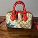 Gucci Bags | Gucci Monogram Gg Supreme Blooms Mini Boston Bag | Color: Blue/Red | Size: Os