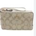 Coach Bags | Coach Khaki/Chalk Corner Zip Wristlet | Color: Cream/Tan | Size: Os