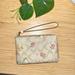 Coach Bags | Coach Corner Zip Wristlet In Signature Canvas: Flower Print | Color: Cream/Tan | Size: Os