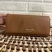 Michael Kors Bags | Michael Kors Wallet Luggage Large Brown Tan Button Flap Clutch | Color: Brown/Tan | Size: Os