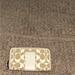 Coach Bags | Crme And Beige Colored Coach Wallet In Excellent Condition | Color: Cream/Tan | Size: Os