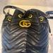 Gucci Bags | Gucci Marmont Gg Black Leather Bucket Bag | Color: Black/Gold | Size: Os
