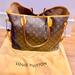 Louis Vuitton Bags | Louis Vuitton Oversize Tote. Love This Bag And It’s Sturdiness To Carry A Lot. | Color: Brown/Tan | Size: Os