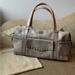 Burberry Bags | Burberry Y2k Leather Duffel Bag In Beige With Gold Accents | Color: Cream/Gold | Size: Os