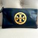 Tory Burch Bags | Genuine Black Leather Tory Burch Clutch With Gold Logo | Color: Black | Size: Os