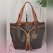 Michael Kors Bags | Michael Kors Large Dark Brown Signature Drawstring Shoulder Bag. Tan Handles.Euc | Color: Brown/Tan | Size: Os