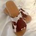 American Eagle Outfitters Shoes | American Eagle Cow Print Slip On Sandals | Color: Brown/Cream | Size: 8