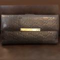 Gucci Bags | Gucci Gg Guccissima Brown Lambskin Continental Bifold Wallet With Coin Section | Color: Brown/Gold | Size: Os