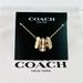 Coach Jewelry | Coach Signature Enamel Black Gold Multi Gold Necklace Cb448 | Color: Black/White | Size: Os