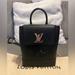 Louis Vuitton Bags | Louis Vuitton Lockme Mini Backpack | Color: Black/Silver | Size: Os