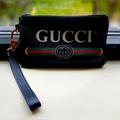 Gucci Bags | Gucci Wristlet | Color: Black | Size: Os