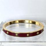 Coach Jewelry | Coach Bracelet Studded Bangle, Burgundy/Gold | Color: Gold/Red | Size: 2.5"