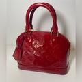 Louis Vuitton Bags | Louis Vuitton Bb Alma Vernis Red Leather Crossbody Bag | Color: Gold/Red | Size: Os