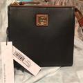 Dooney & Bourke Bags | Dooney & Bourke 2018 Black Pebble Leather North/South Janine Crossbody Nwt | Color: Black | Size: Os