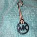 Michael Kors Accessories | Nwot Michael Kors Hang Tag, Nude Beige Leather, Silver Tone Logo | Color: Cream/Silver | Size: Length 9" Diameter 2"