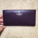 Kate Spade Bags | Kate Spade Ny Wine Colored Slim Bifold Wallet | Color: Gold/Pink/Red | Size: Os