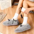 Chaussures chauffantes électriques USB pour femmes et hommes chaussons en peluche chauffe-pieds